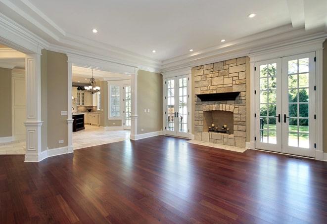 wide-angle shot of wood floors in a spacious hallway